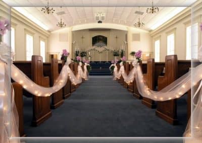 Tulle and lights for church pews