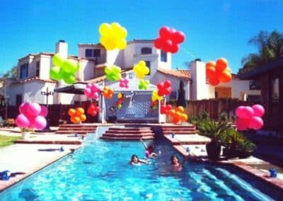 Balloon topiary arch over pool-Private party