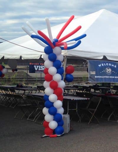 Red, white and blue balloon column with flowing top-Train Station