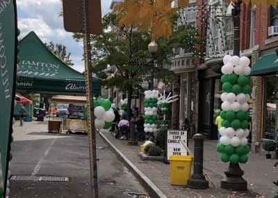 Balloons covering light poles outside-Downtown Binghamton