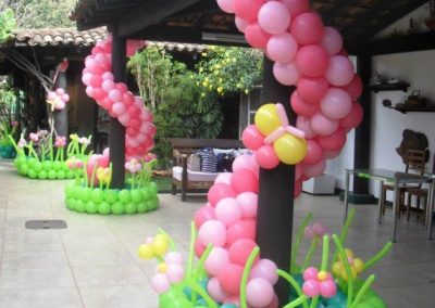 Spring balloons bright and fun wrapping around poles outside-Private party