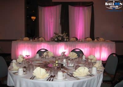 Headtable with backdrop and up-lighting-Owego Treadway