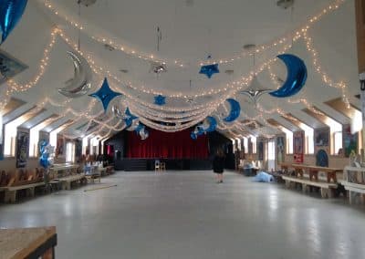 Jewish celebration lights and balloon ceiling