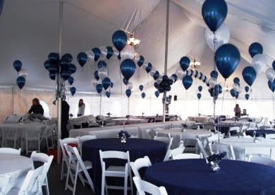 Simple balloon arches and centerpieces for tent