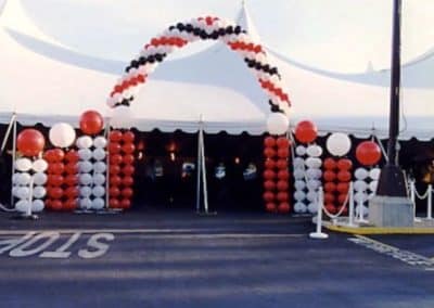 Red, white and black arches, columns tent entrance